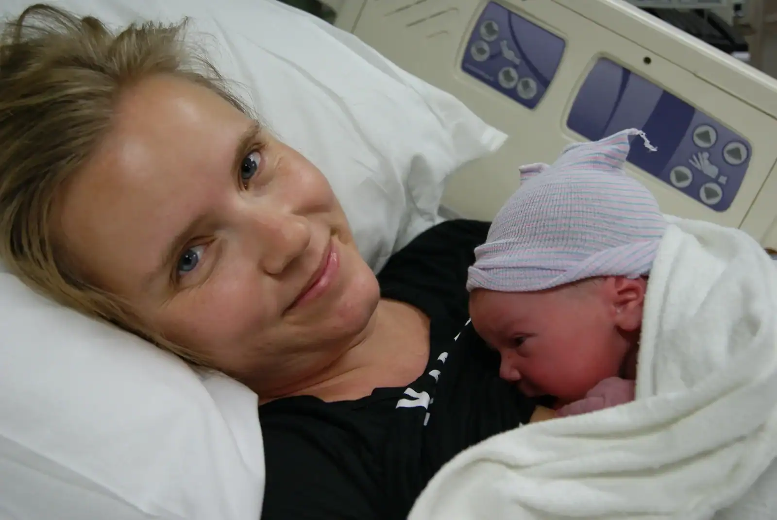 Woman holding her newborn baby