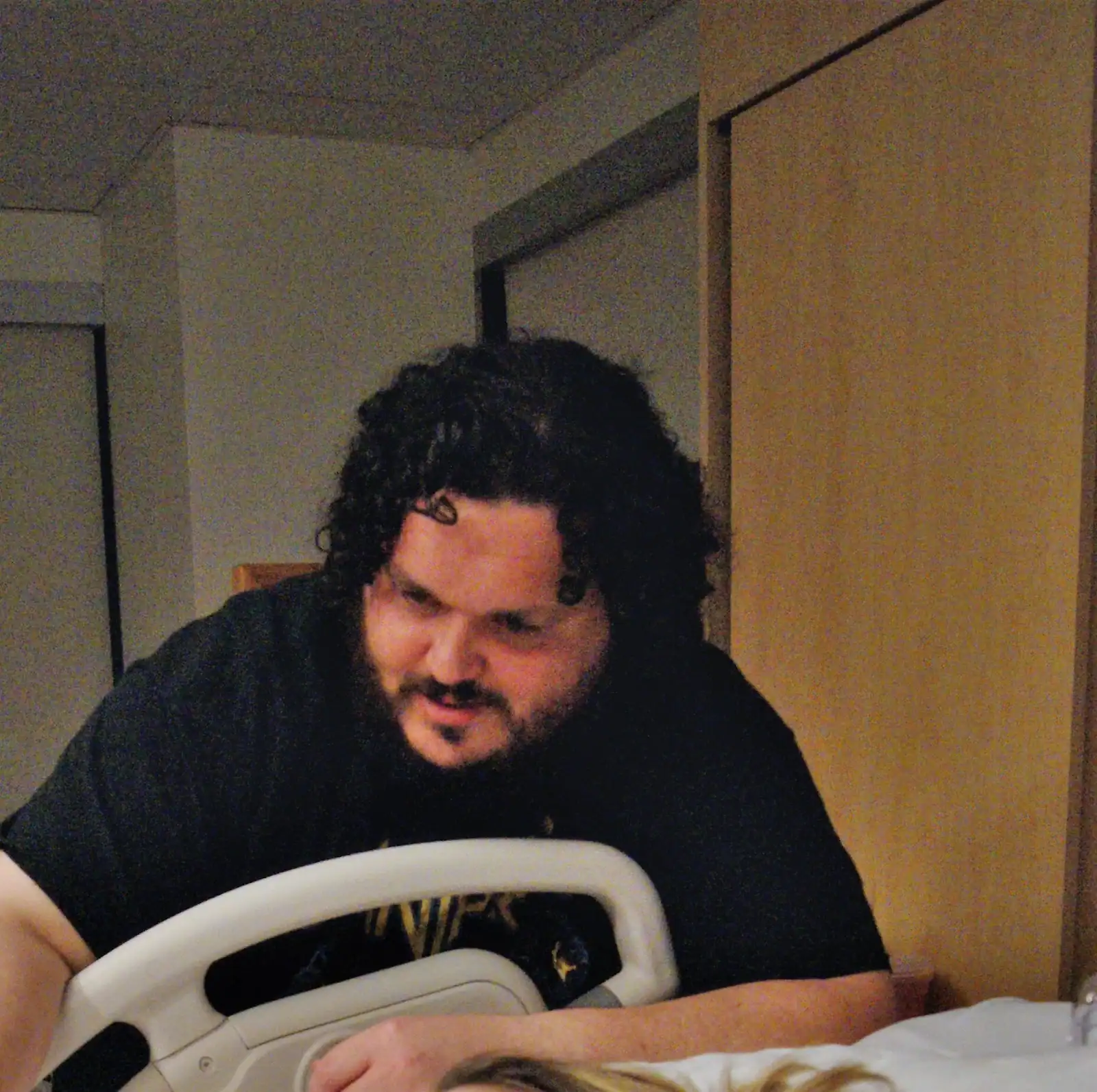 Caring doula providing emotional and physical support during childbirth.